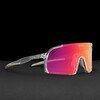 EDDY Clear Sunset Red – side view of the sports sunglasses with interchangeable lenses. 
